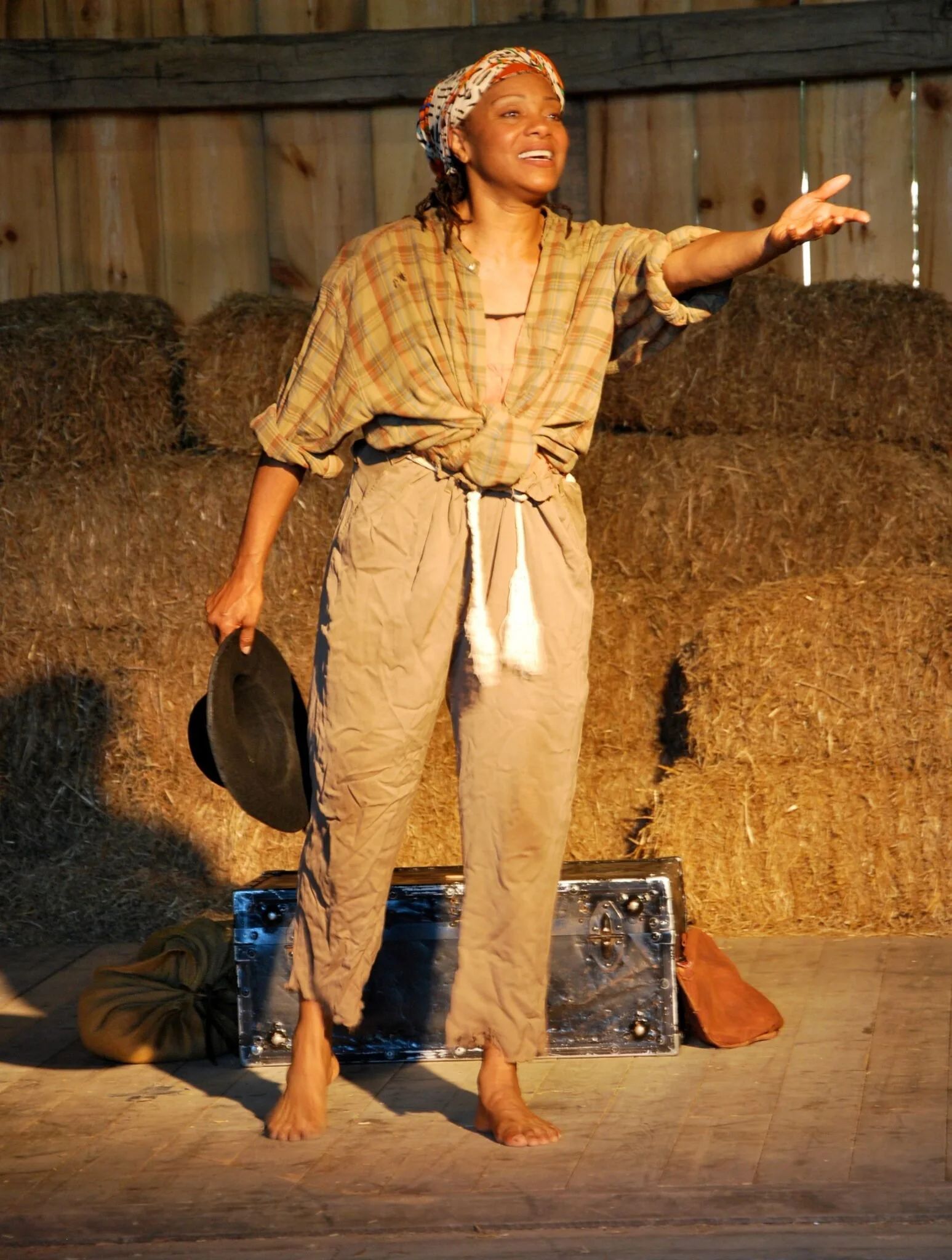 A performer on stage in a North Coast Rep production